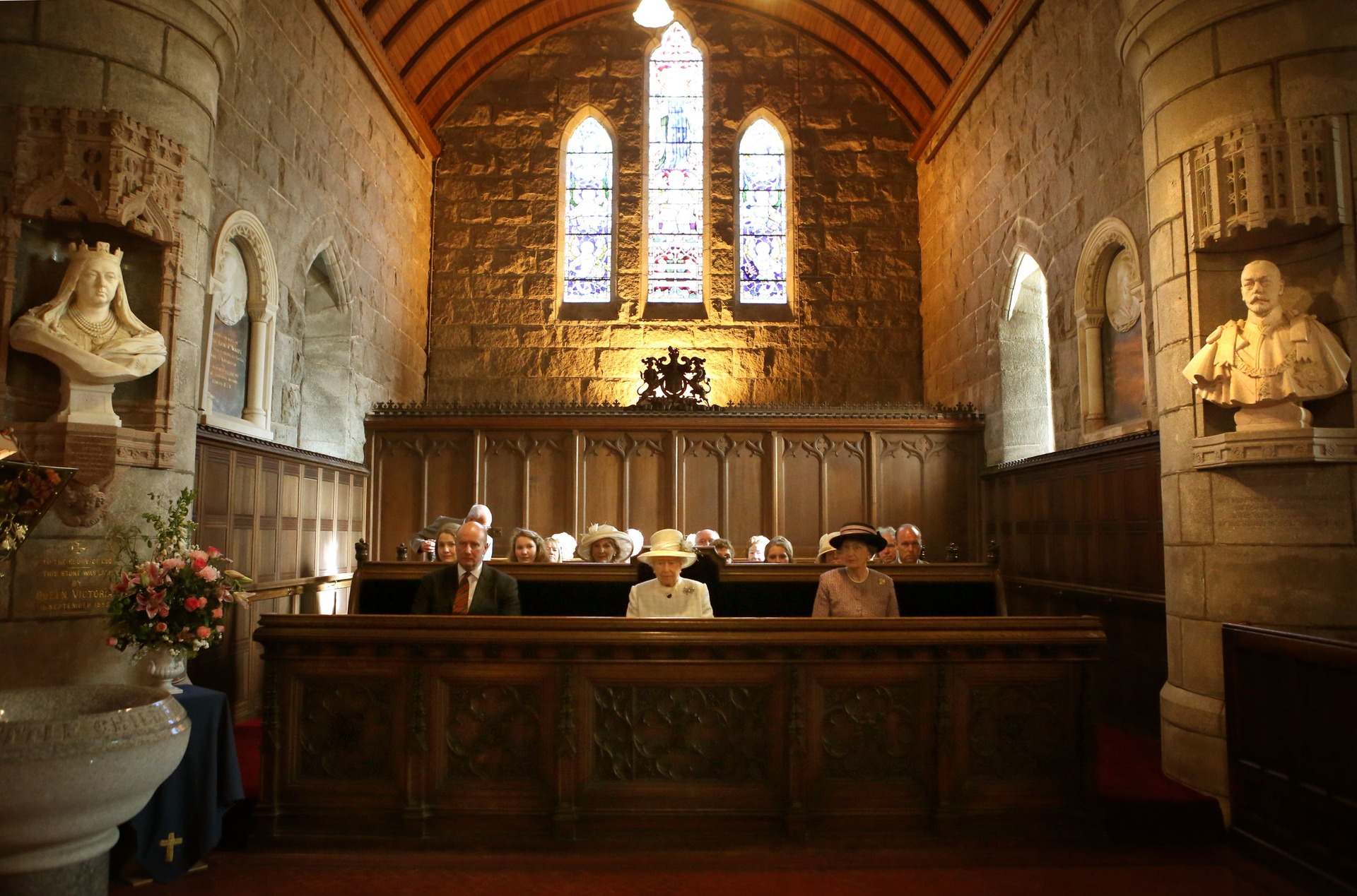 Queen Elizabeth II sits in Crathie Kirk during a service in 2014 (PA). 