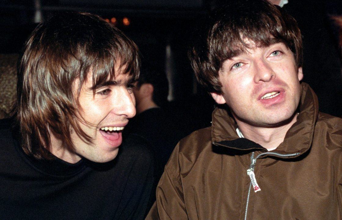 Oasis top album charts for first time in 14 years amid reunion ticket furore