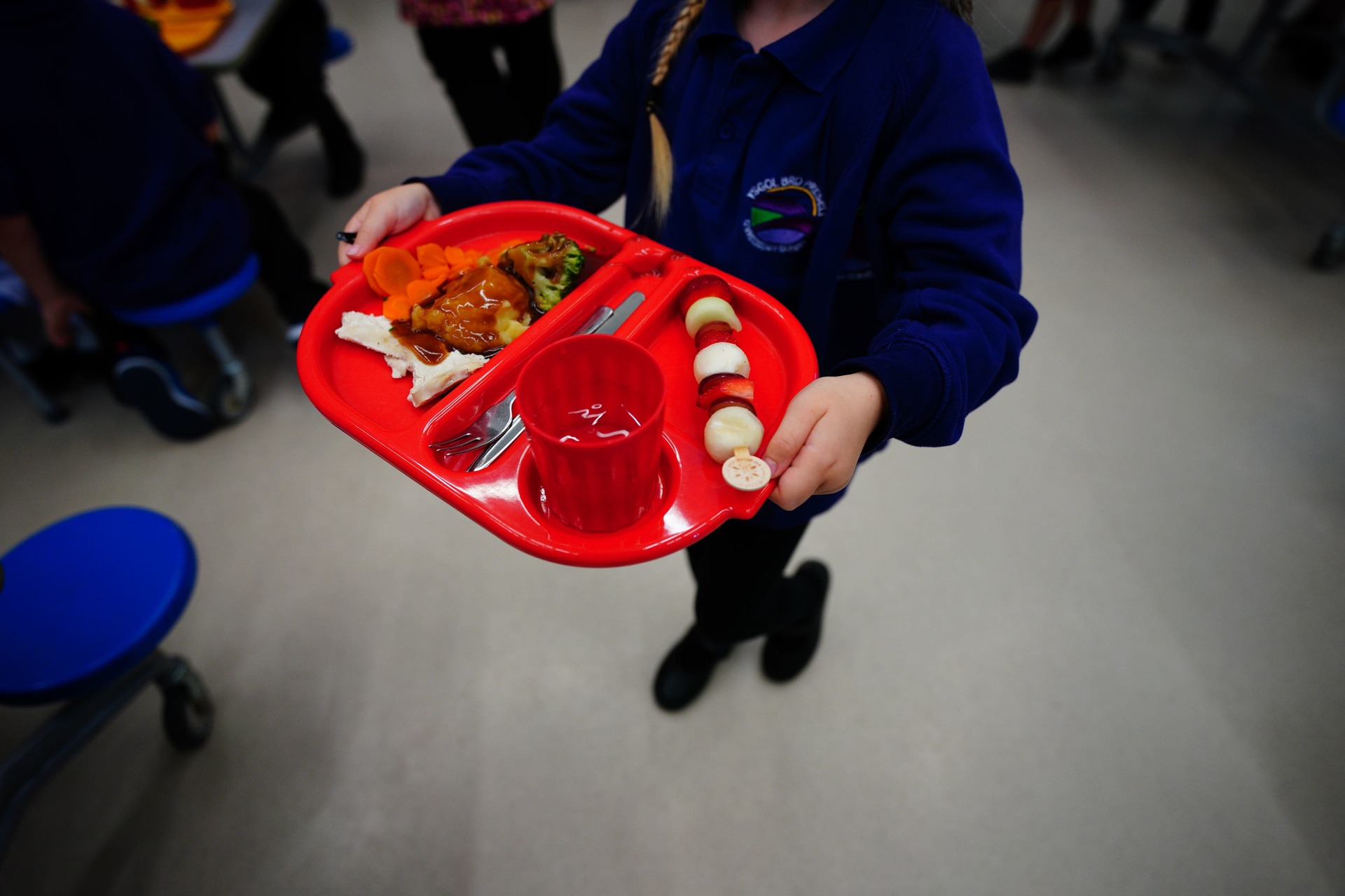 The SNP are being urged to reverse plans to scrap universal free school meals for primary pupils (Ben Birchall/PA). 