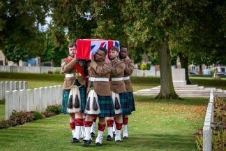 Princess Anne pays respect to unidentified Scots soldiers who received military burial