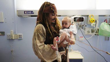 Johnny Depp surprises children in hospital dressed as Captain Jack Sparrow