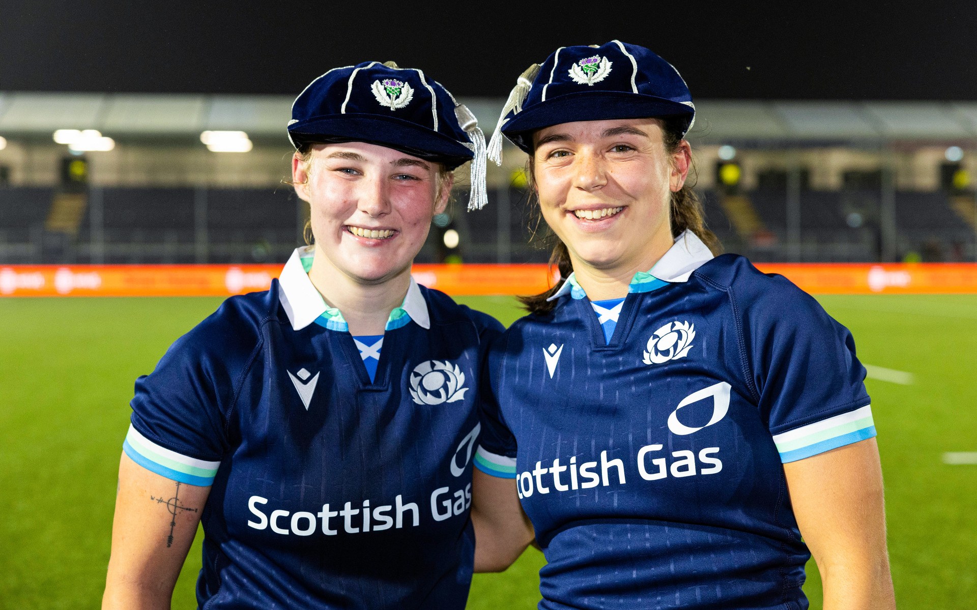 EDINBURGH, SCOTLAND - SEPTEMBER 06: Scotland's Leia Brebner-Holden (L) and Lucia Scott (R) are awarded their first caps at full time during an Autumn Test match between Scotland and Wales at the Hive Stadium, on September 06, 2024, in Edinburgh, Scotland. (Photo by Ross Parker / SNS Group)