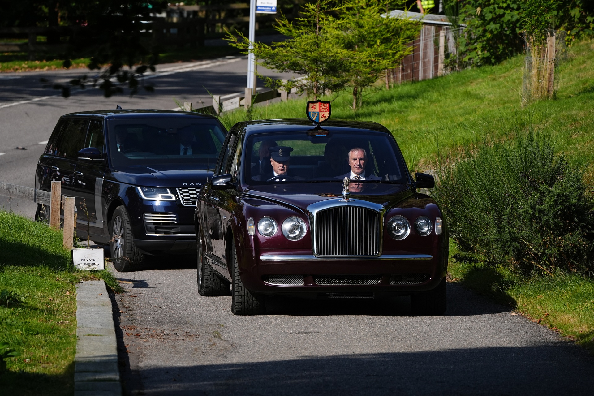 The King and Queen arrive at Crathie Kirk (Aaron Chown/PA). 