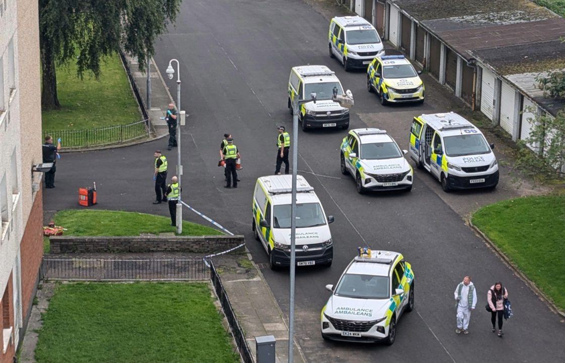 Man falls from Glasgow flat block window as police cordon off street