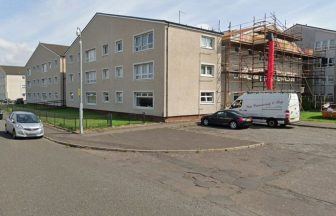 Man arrested after woman found injured and body discovered in flat in Ardrossan