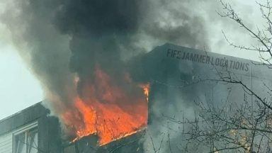 Locals urged to keep windows closed after fire breaks out at Fife flat block