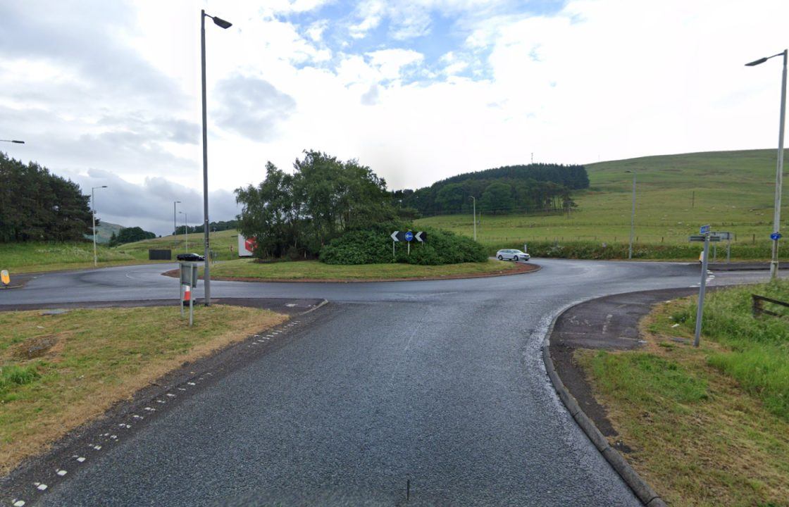 Man in hospital after crash involving car and lorry towing a trailer on M74