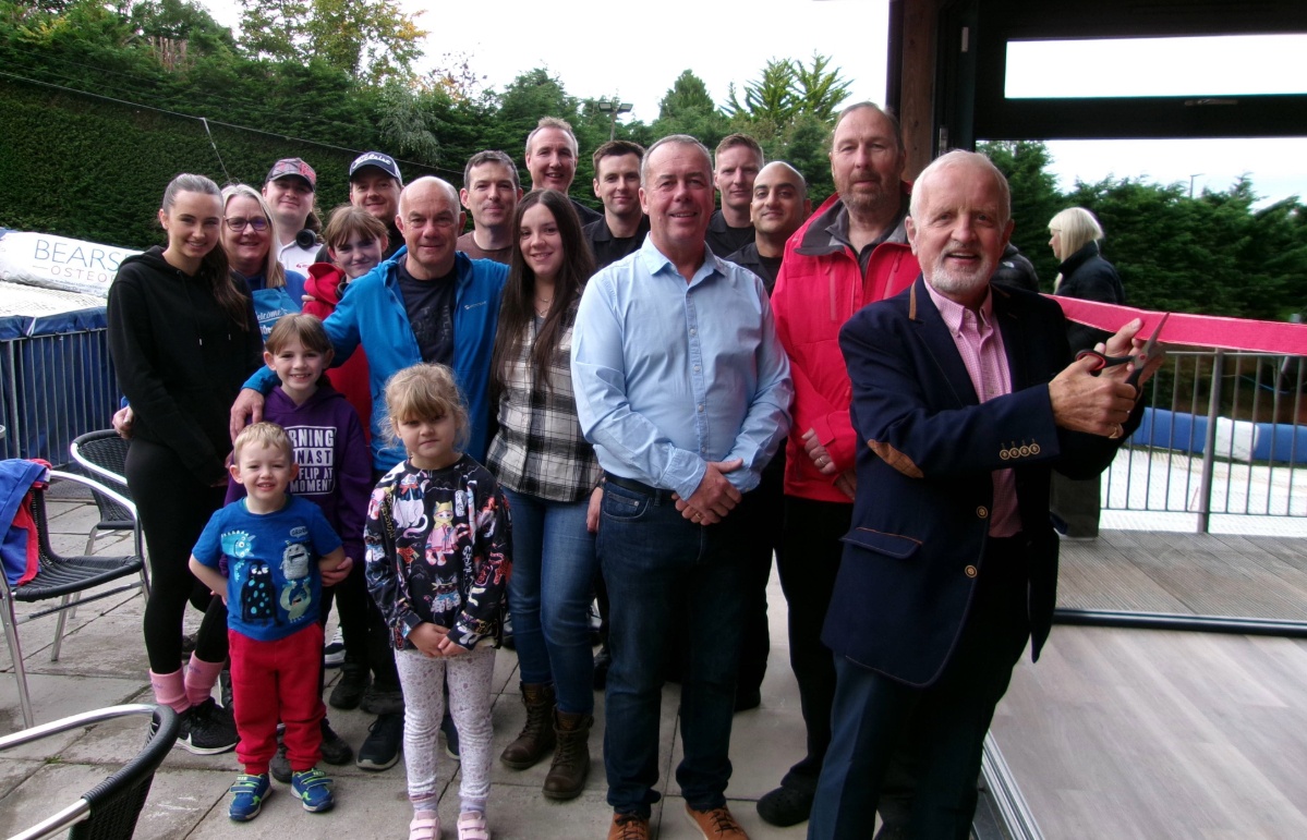 John Watson OBE cut a ribbon to mark the opening of the Bearsden Snowsports Club. 