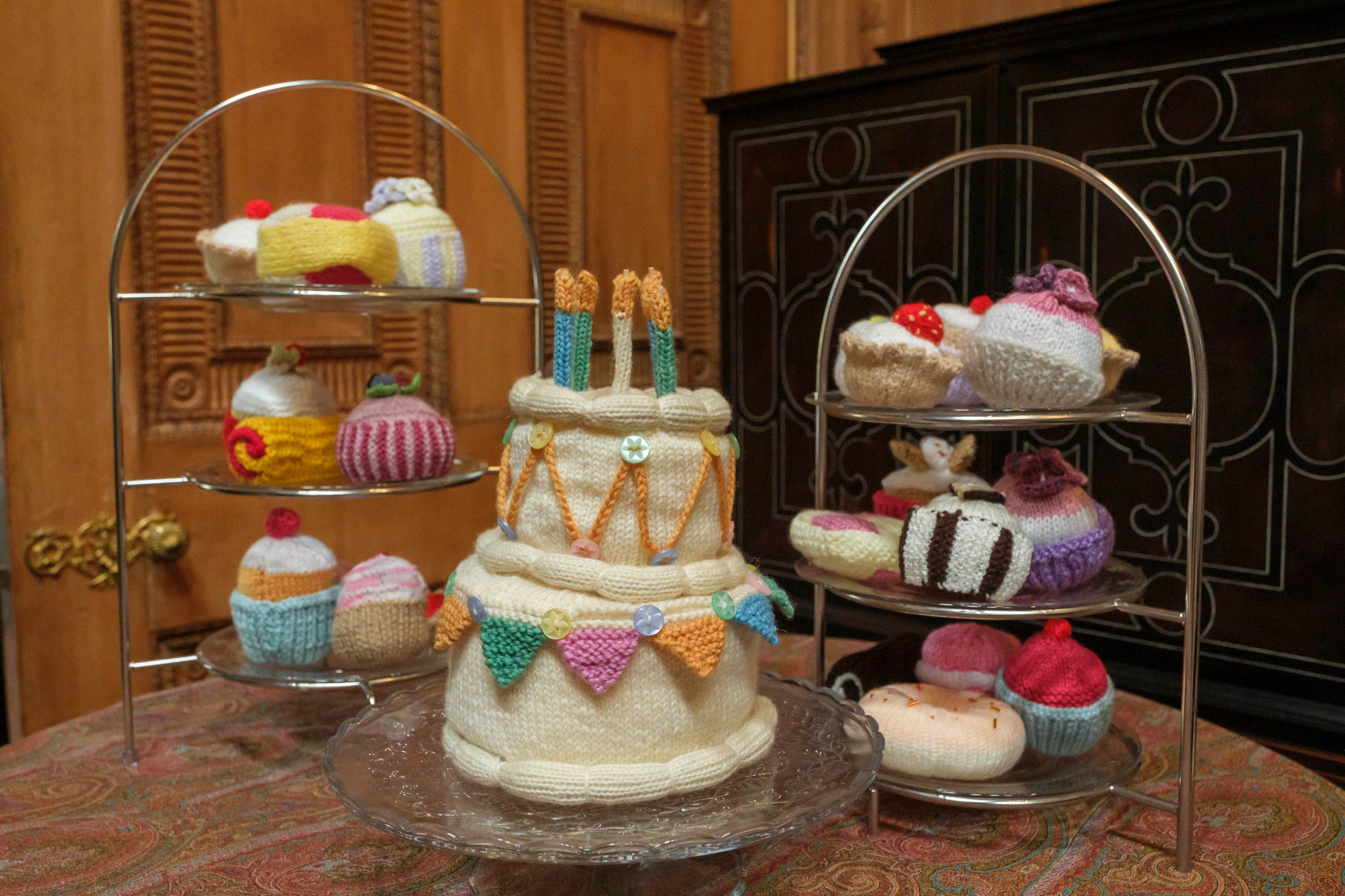 The collection of cakes in celebration of 10 years of Future Textiles ( Mike Wilkinson/King’s Foundation/PA). 