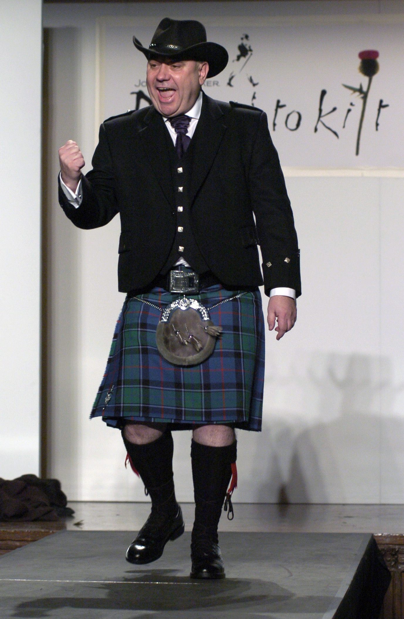 Scottish National Party Leader Alex Salmond walks down the runway at the 'Dressed to Kilt' fashion show held at the Synod House at St. John the Divine Cathedral Garden in New York (Getty Images)