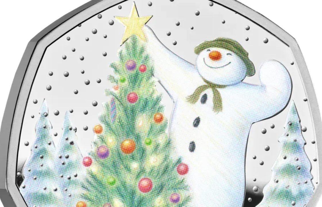 Gold Snowman coin hidden in advent calendar for someone to find on Christmas Eve