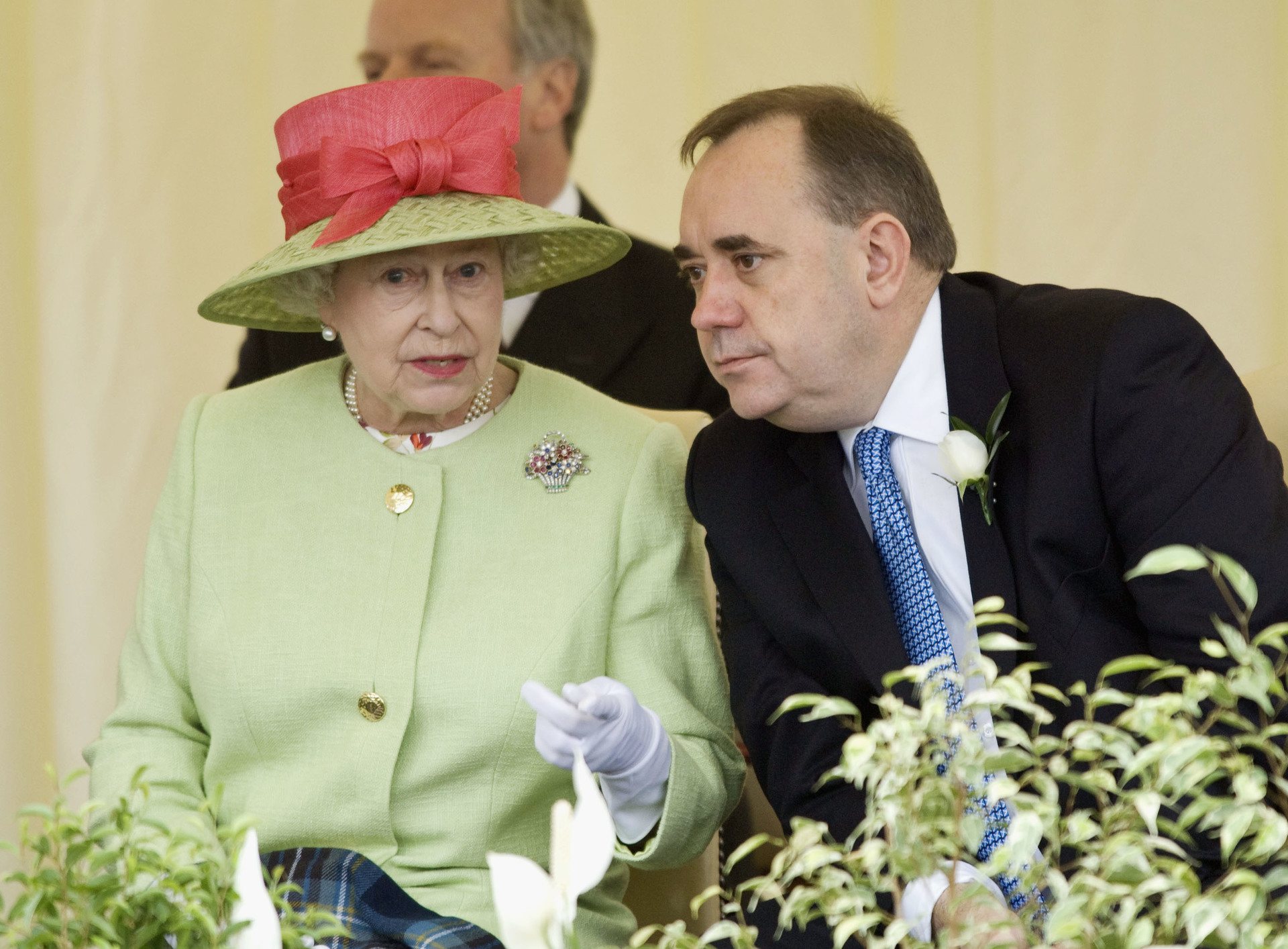 Queen Elizabeth II and Scotland's First Minister Alex Salmond watch the Riding procession go past at the opening of the third session of the Scottish Parliament on June 30, 2007 in Edinburgh.