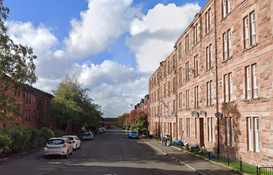 Three men taken to hospital charged as police lock down Glasgow street after assault