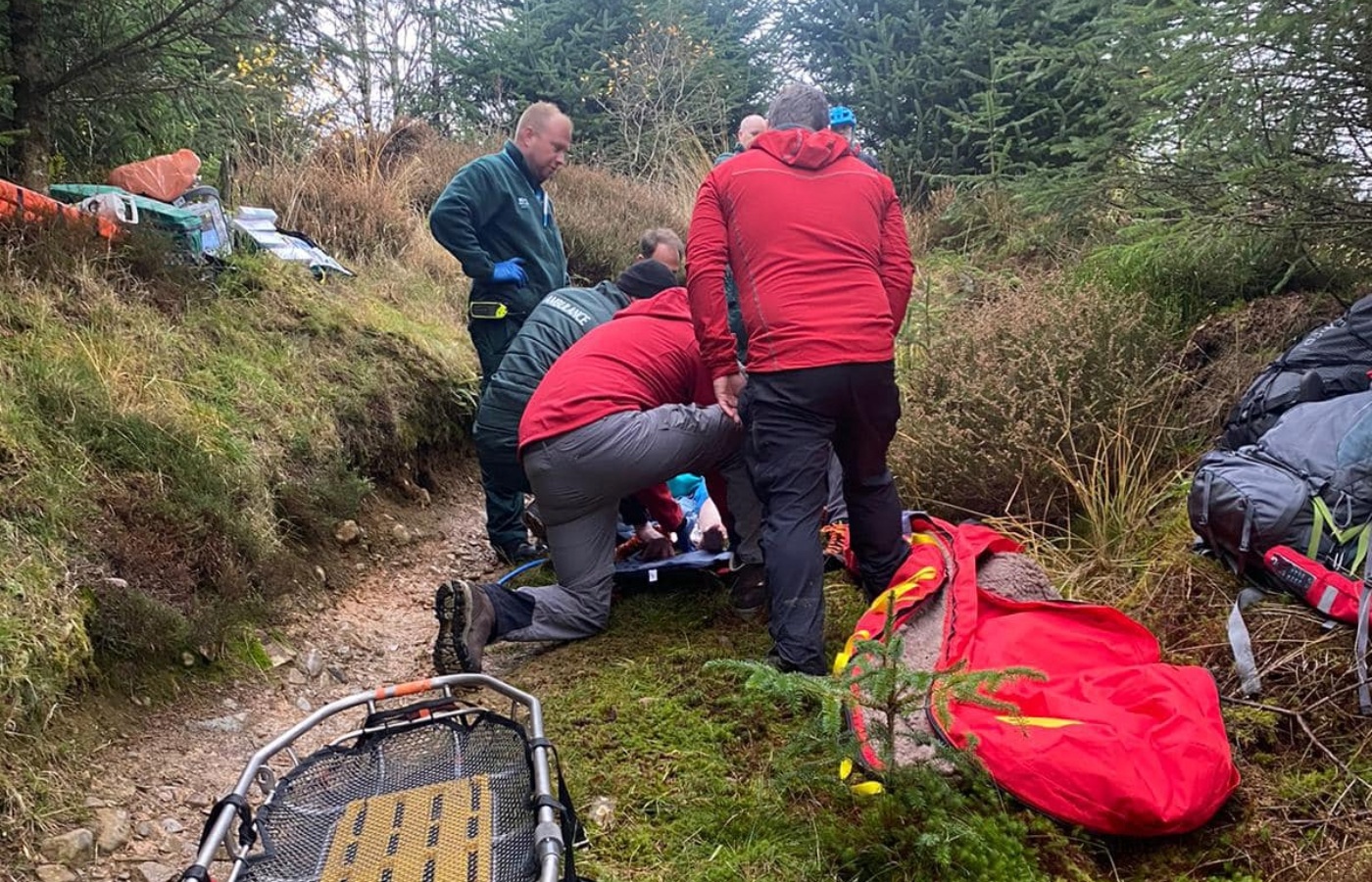 Emergency services were called after the biker sustained injuries in Ae Forest.