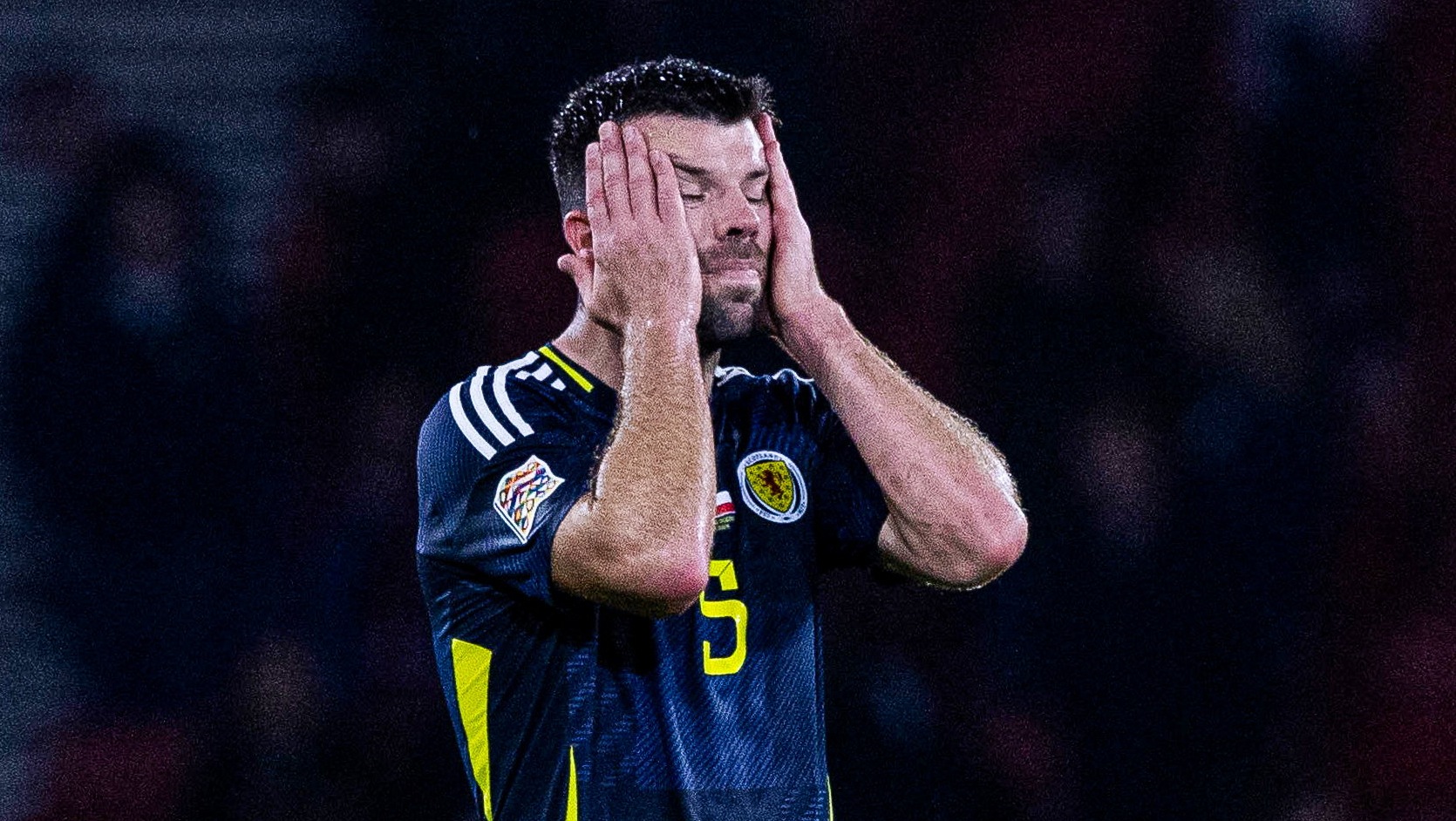 GLASGOW, SCOTLAND - SEPTEMBER 05: Scotland's Grant Hanley looks dejected at full time during a UEFA Nations League - League A Group 1 match between Scotland and Poland at Hampden Park, on September 05, 2024, in Glasgow, Scotland. (Photo by Craig Williamson / SNS Group)