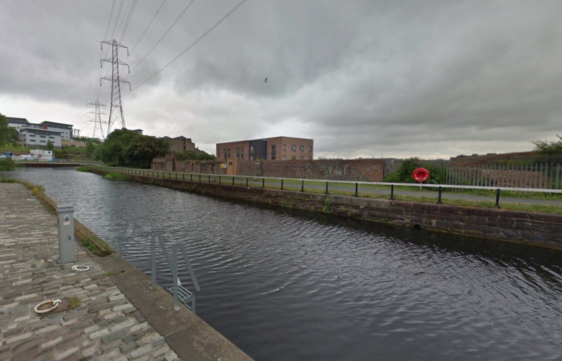 Man taken to hospital after police alerted to ‘person in canal’ in Glasgow