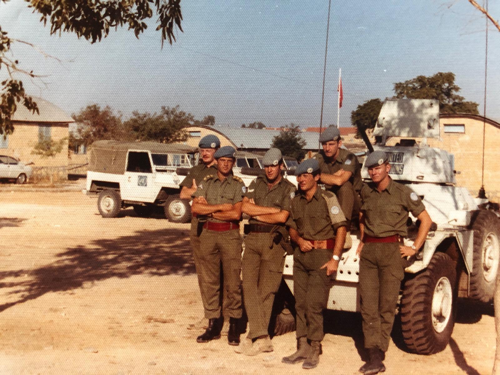 Derek Bennett, back,  sitting on a UN peacekeeping vehicle in Cyprus (David Wooliscroft/PA). 