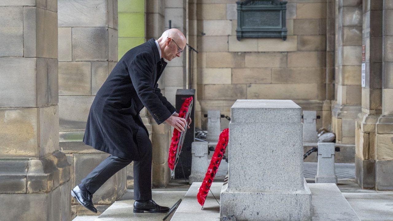 Swinney pays tribute to war hero uncle as nation pauses on Remembrance Sunday