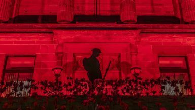 Glasgow school lights up red in memory of 177 pupils who lost lives on frontline