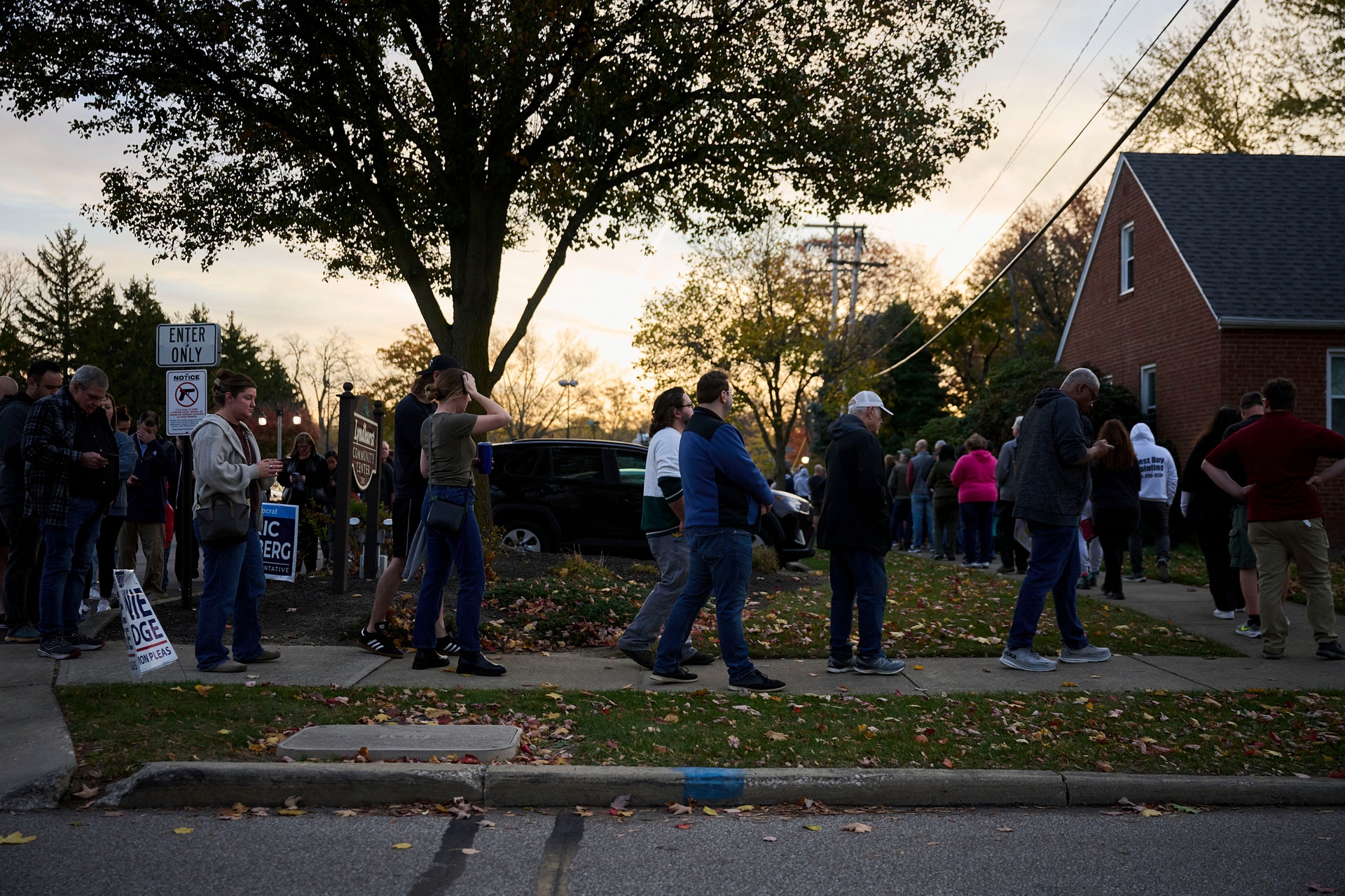 Voters wait in line to cast their ballot at a polling location for the 2024 Presidential election in Lyndhurst, Ohio, US, on Tuesday, Nov. 5, 2024. The 2024 presidential campaign was marked by two assassination attempts, a candidate switch, divisive rhetoric and warnings about the fate of democracy. Photographer: Dustin Franz/Bloomberg via Getty Images