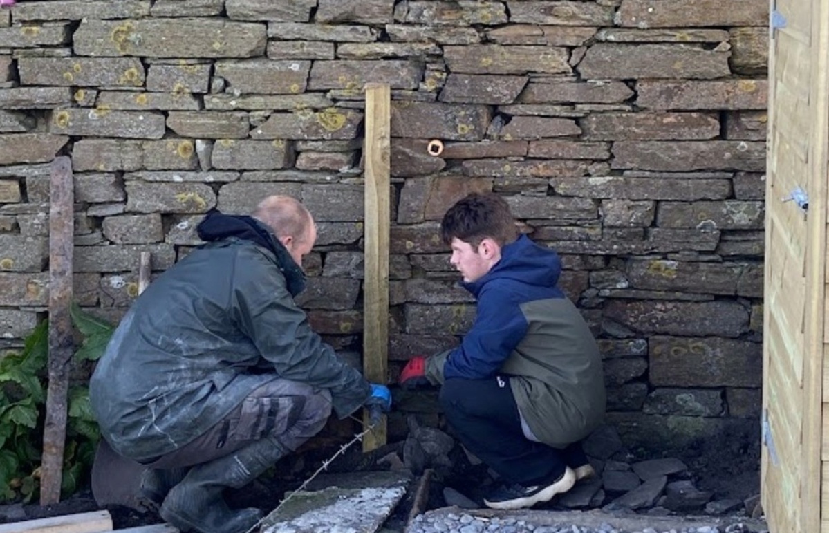 Work takes place to restore a building on Swona (Gordonstoun School/PA Wire) 