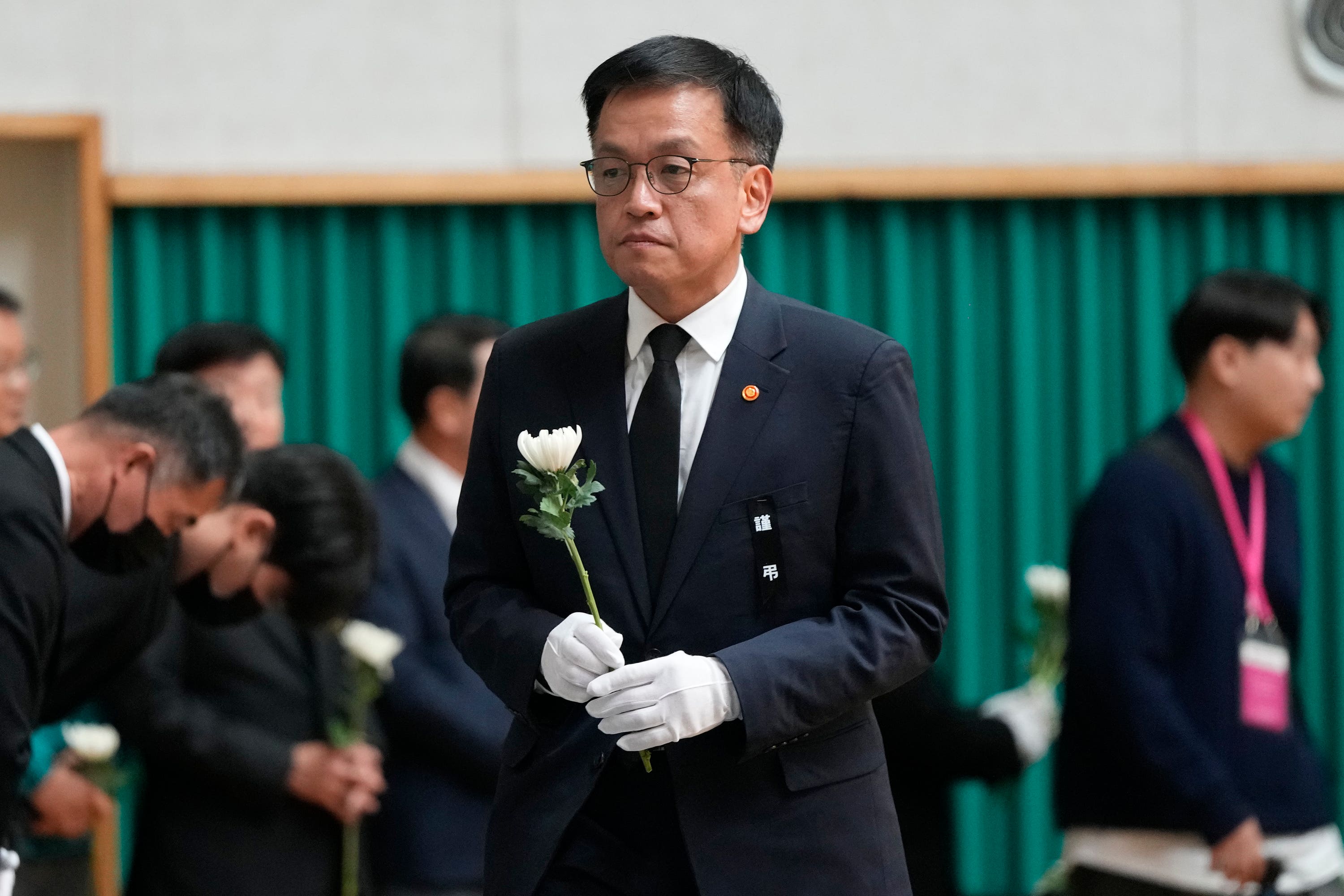 South Korea’s acting President Choi Sang-mok arrives to pray for the victims on a plane that skidded off a runway and burst into flames (AP/Ahn Young-joon). 