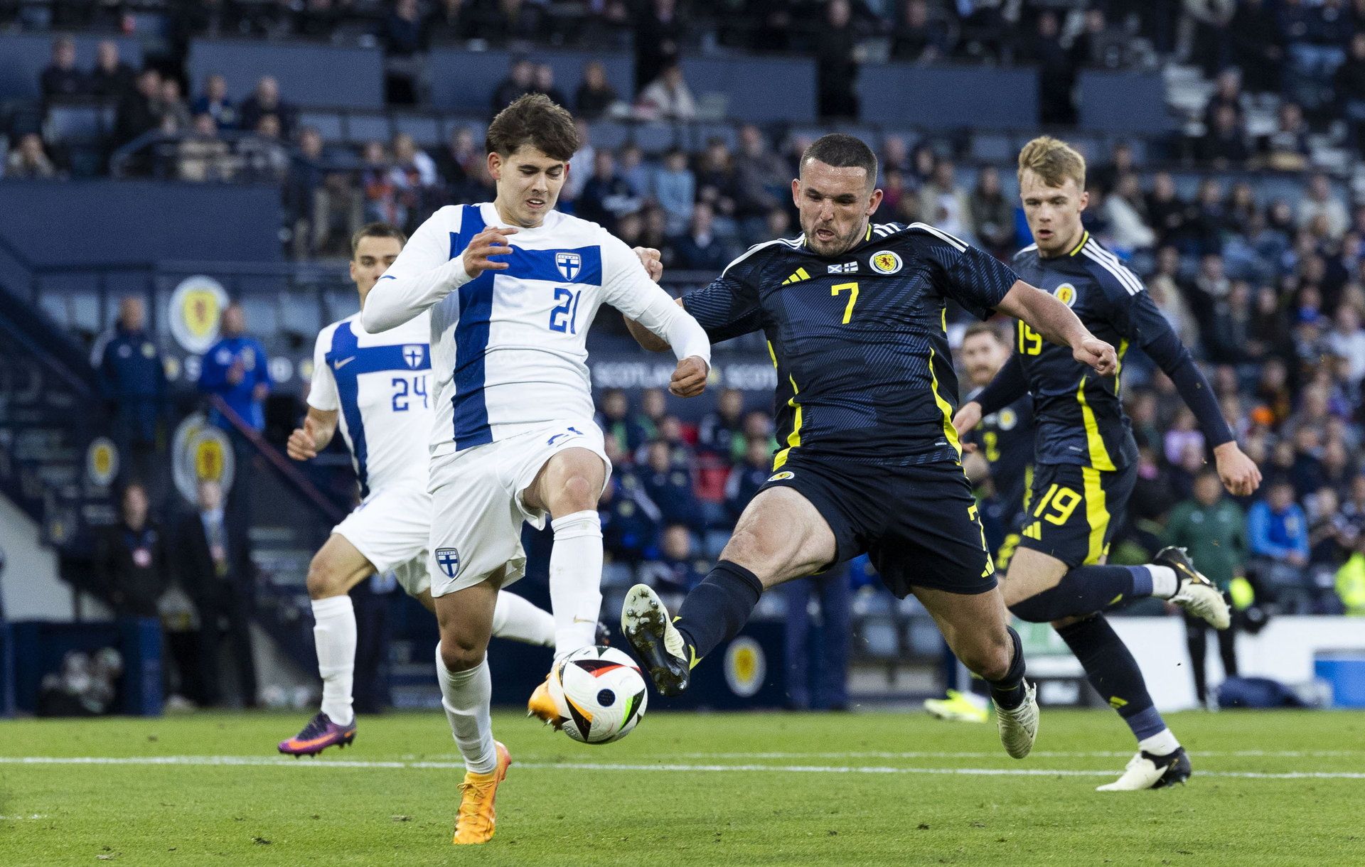 Scotland's John McGinn and Finland's Tomas Galvez in action (Craig Foy / SNS Group)