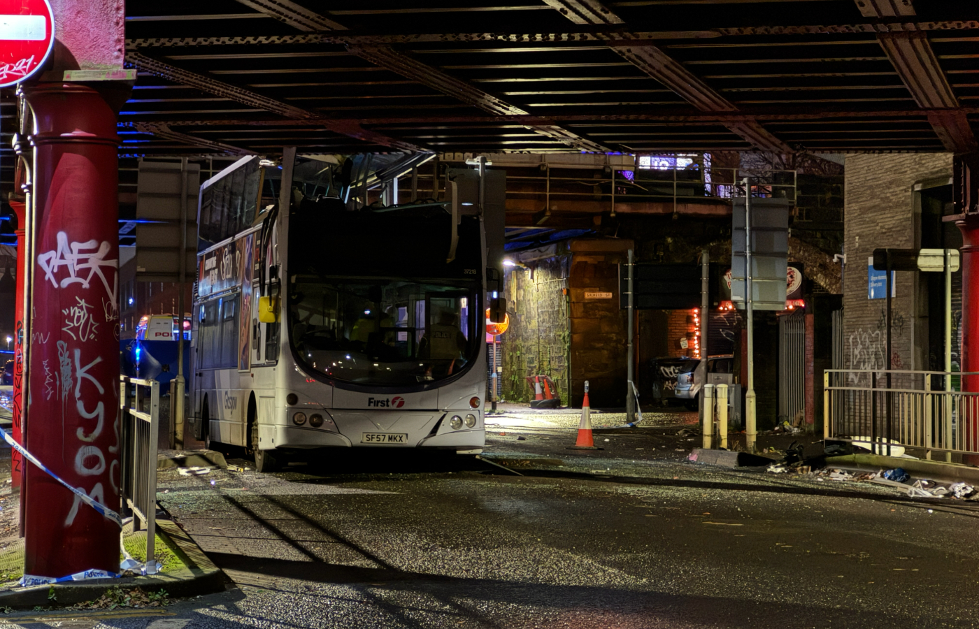 Double-decker bus crashes into bridge in Glasgow as roads closed.