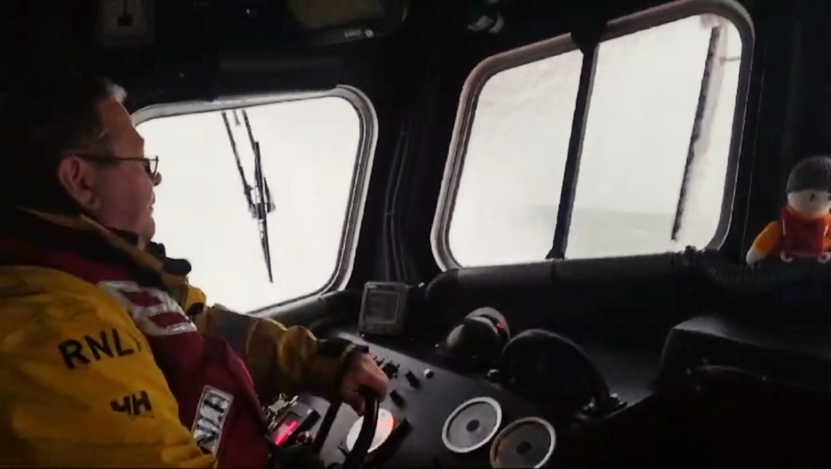 Dunbar RNLI inshore lifeboat launches in high winds. 