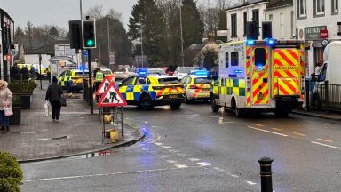 Man arrested and street closed following shop disturbance in Cumbernauld