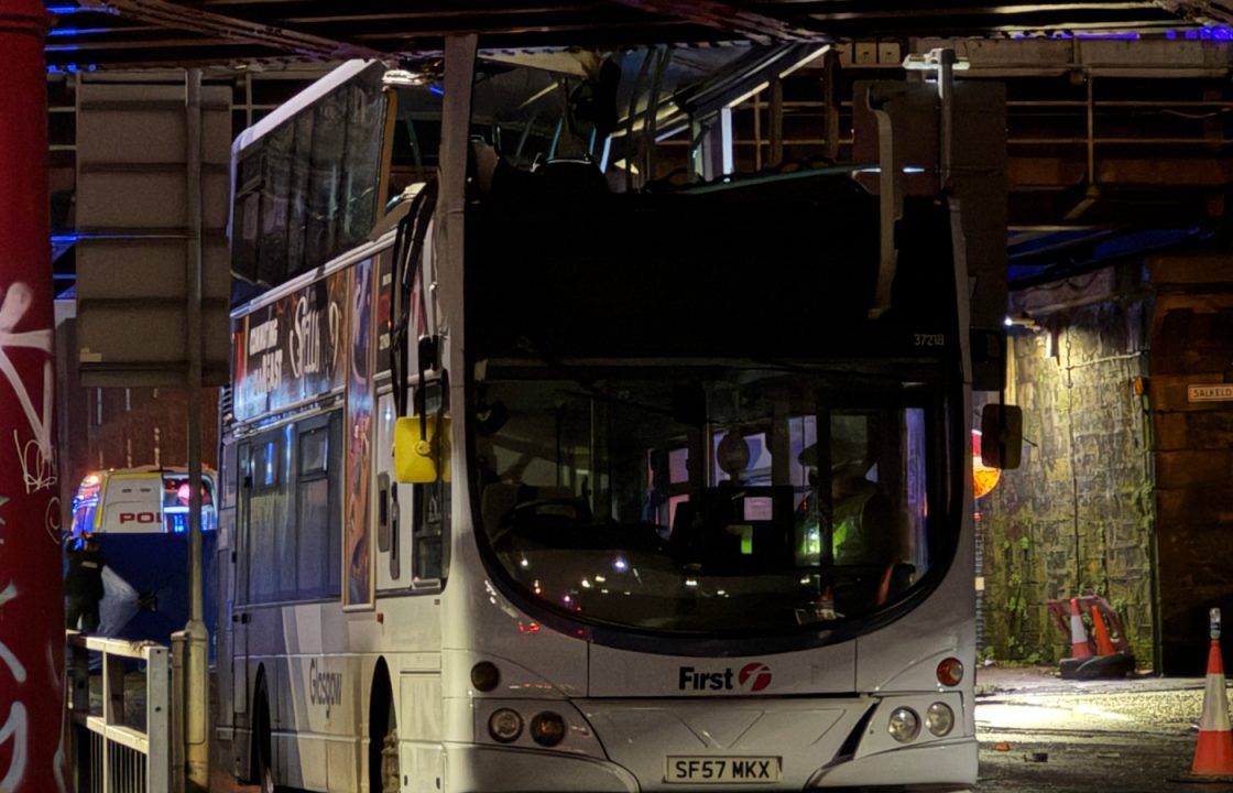 Man fighting for life among injured after double-decker bus crashes into bridge in Glasgow