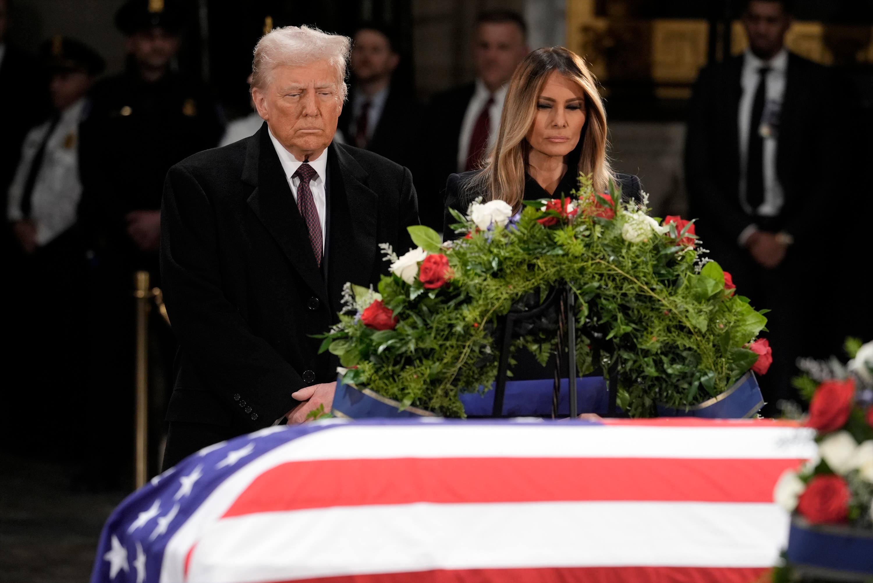 President-elect Donald Trump paid his respects at Mr Carter’s casket on Wednesday (J Scott Applewhite/AP) 