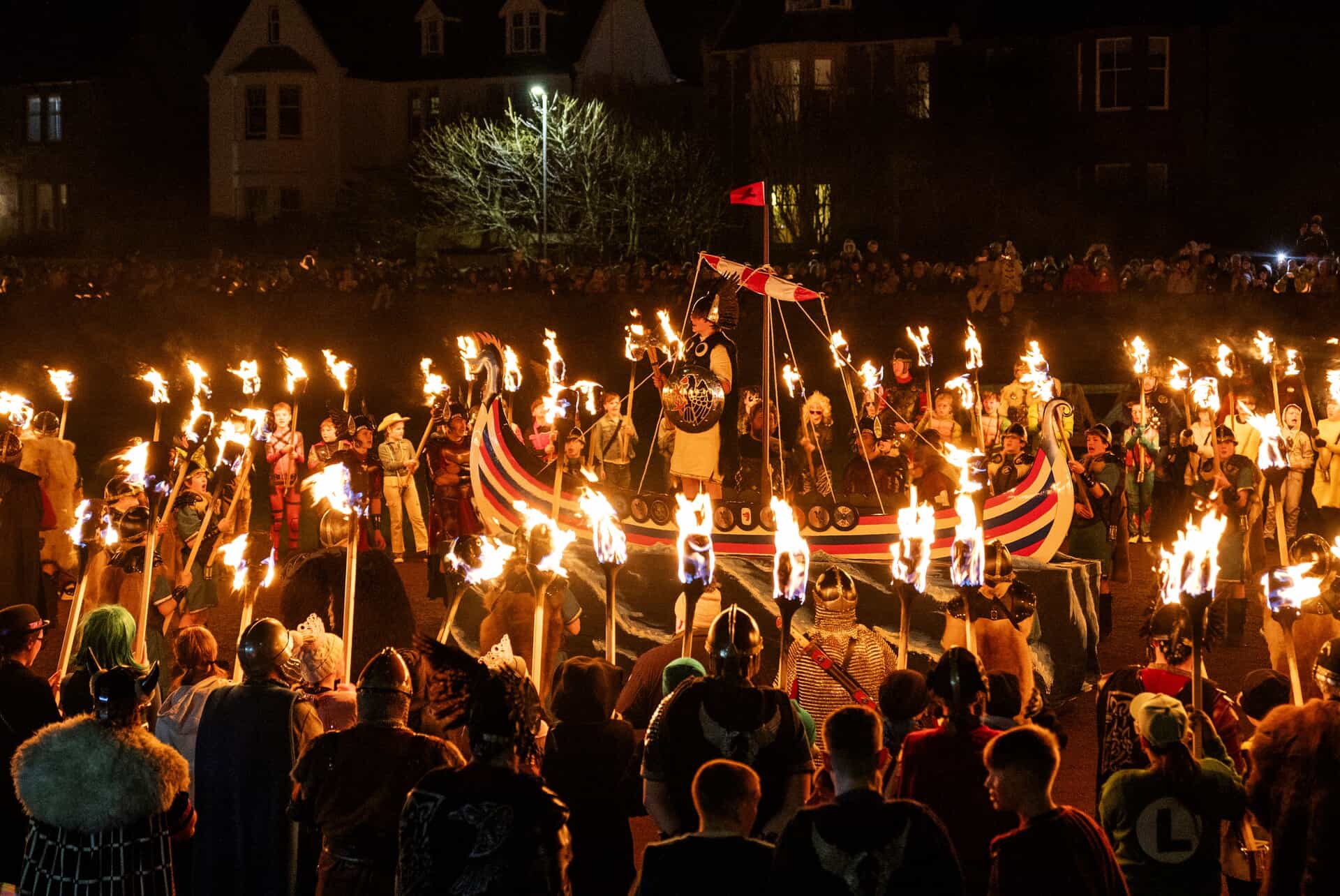 Youngsters take part in the torch procession (Jane Barlow/PA) 