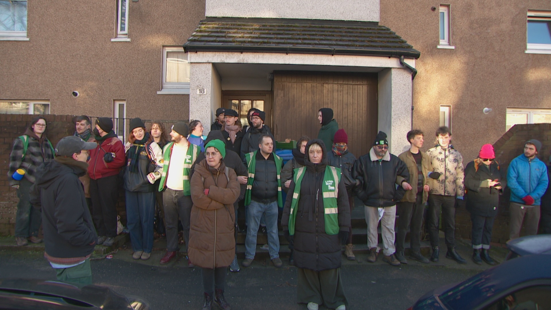 A group of supporters gathered outside the flat on Tuesday.