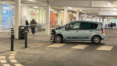 Man taken to hospital after car crashes into bollards outside Tesco in Dunfermline