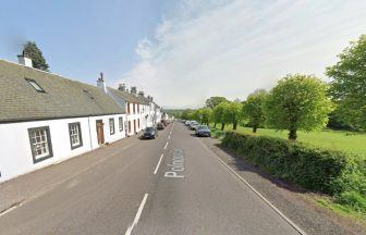 Cyclist taken to hospital and Polnoon Street closed after crash involving car in East Renfrewshire