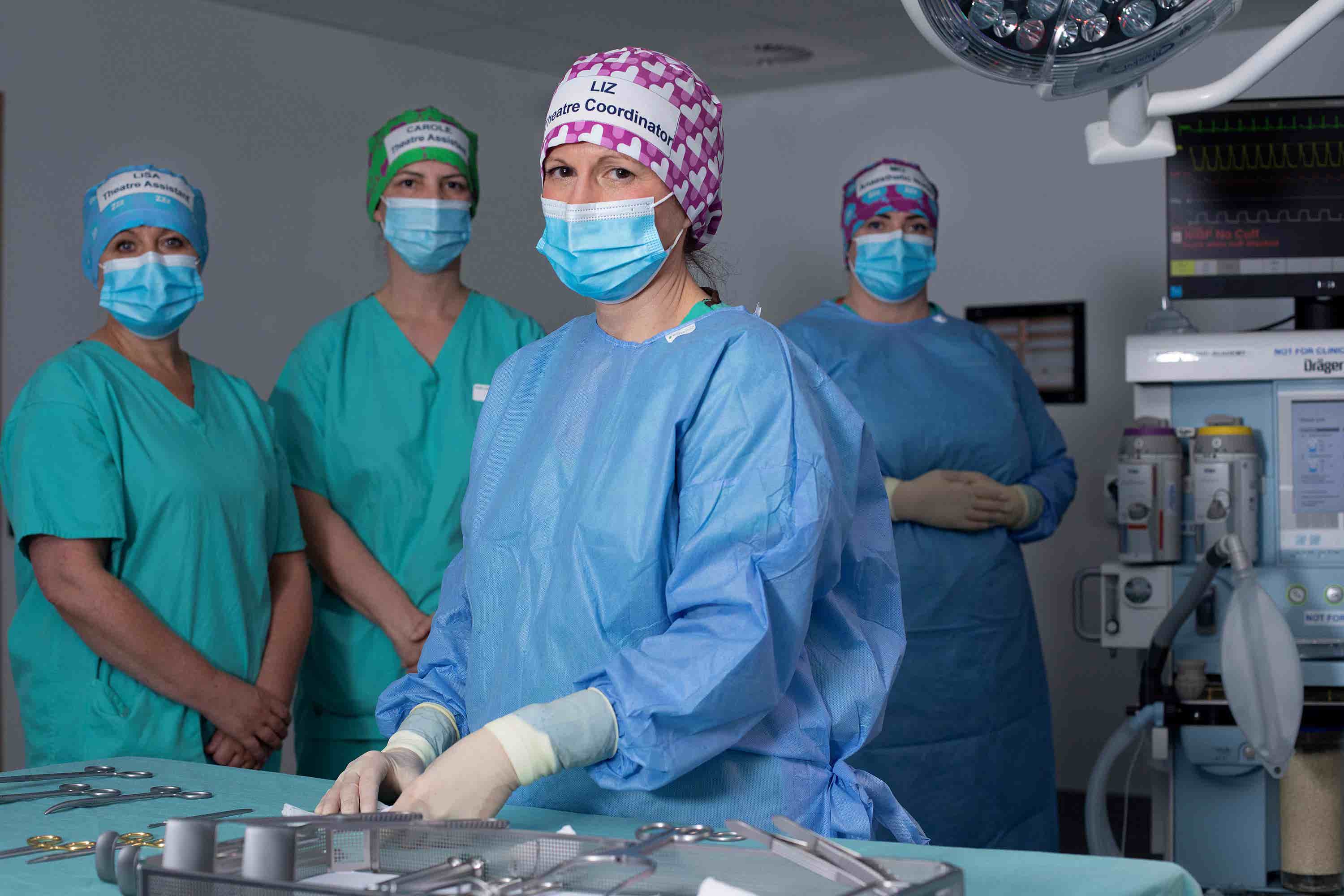 Medical staff can be more easily identified by patients and colleagues with the caps (Marsaili Mainz/PA) 