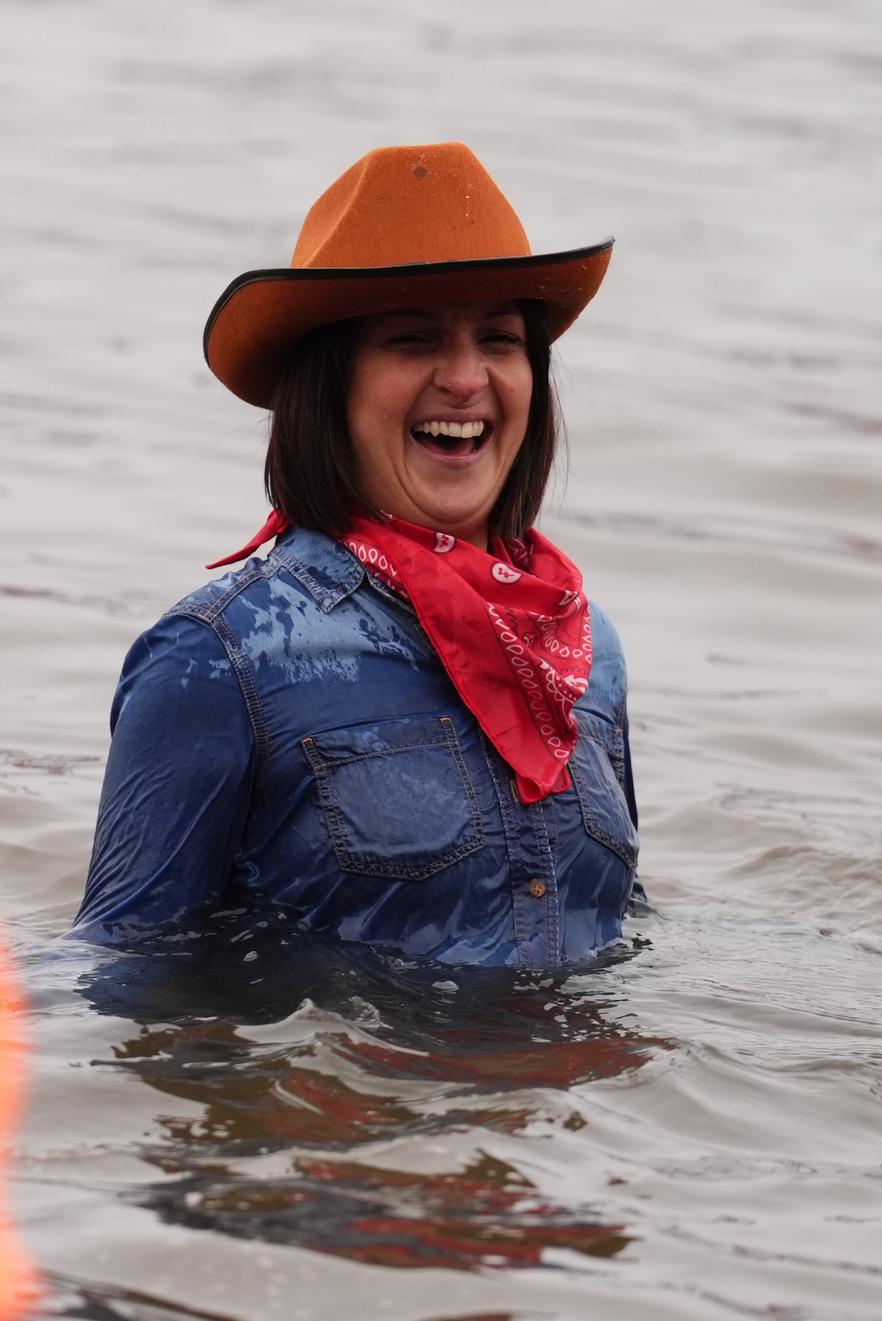 People take part in the Loony Dook New Year's Day dip in the Firth of Forth at South Queensferry, as part of Edinburgh's Hogmanay celebrations. Picture date: Wednesday January 1, 2025.