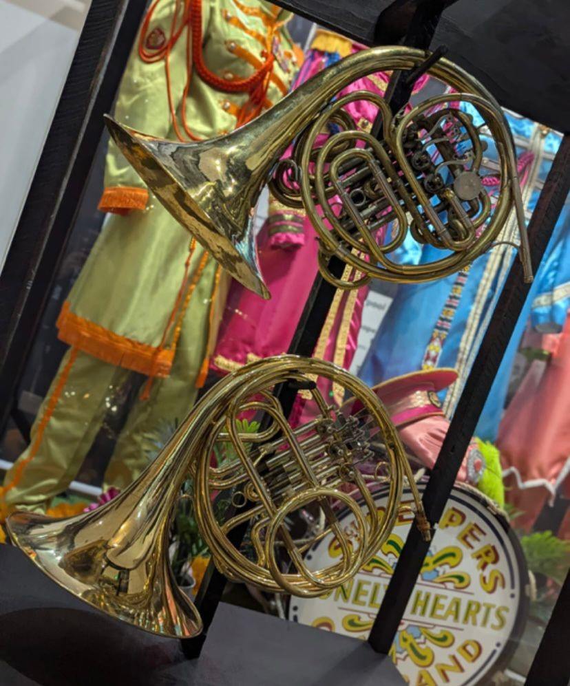 Two of the four French horns used on Sgt. Pepper’s (Liverpool Beatles Museum/PA) 