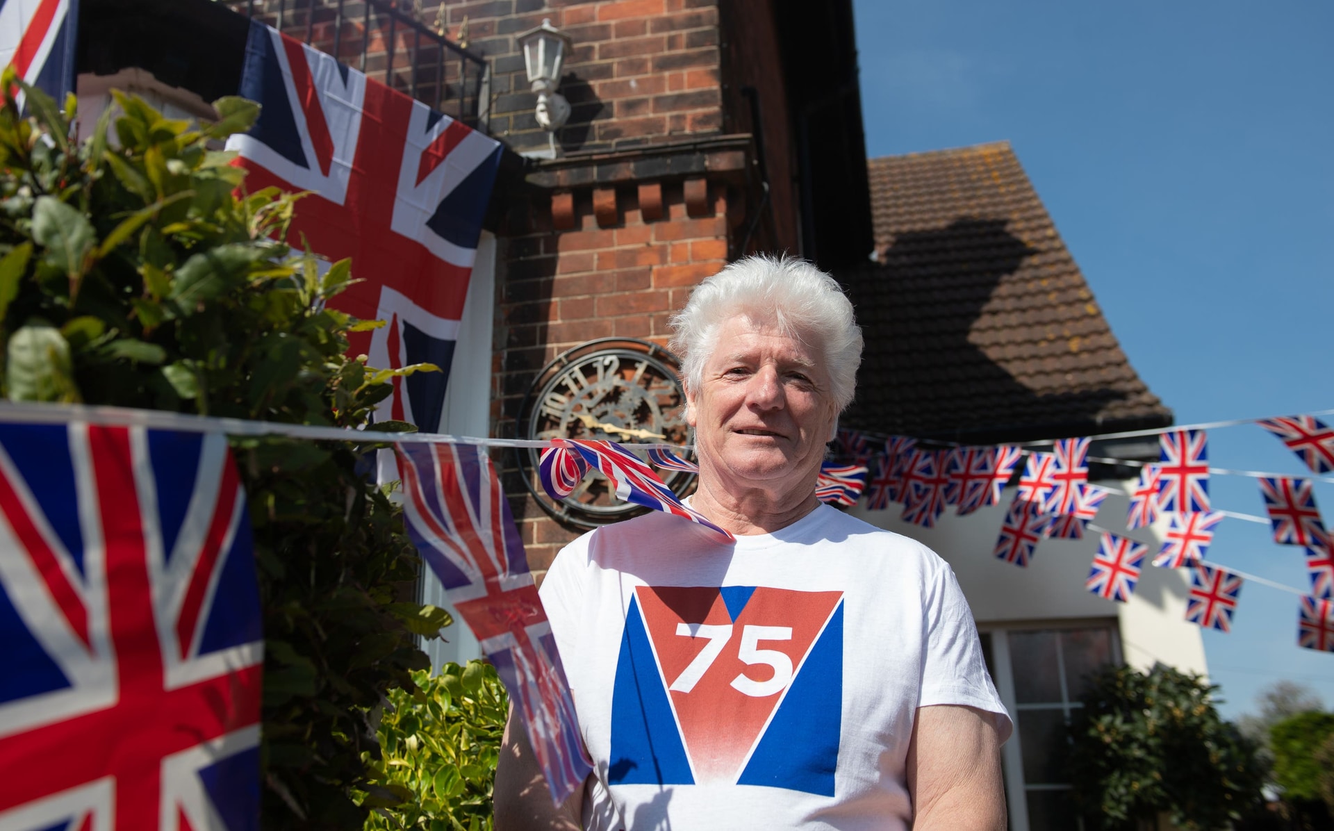 Bruno Peek celebrated a previous anniversary of VE Day by decorating his house with flags and bunting (Joe Giddens/PA) 