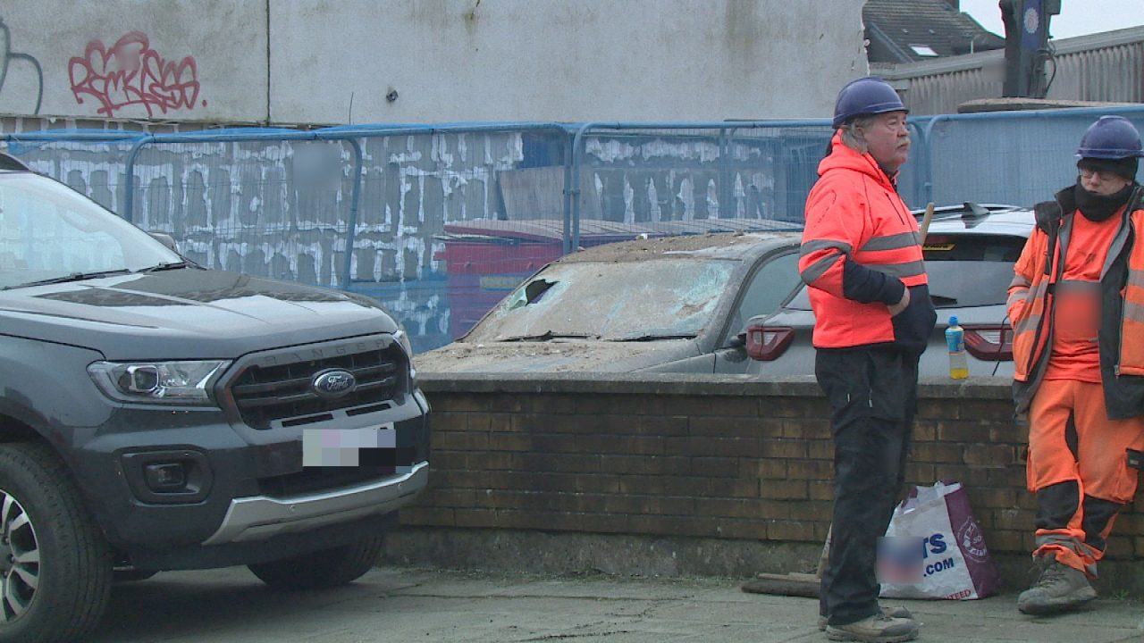 Glasgow building collapses smashing nearby car windscreen at demolition site