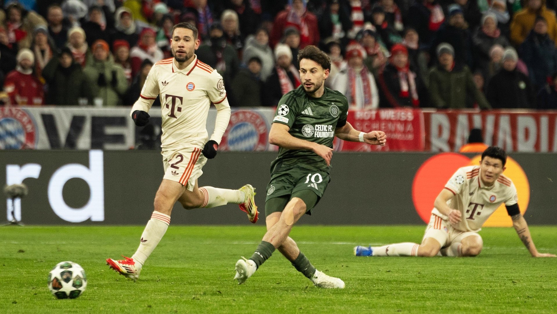 Celtic’s Nicolas Kuhn scores to make it 1-0 during the UEFA Champions League 2024/25 League Knockout Play-off second leg match between FC Bayern Munich and Celtic at the Allianz Arena, on February 18, 2025, in Munich, Germany.  (Photo by Craig Foy / SNS Group)