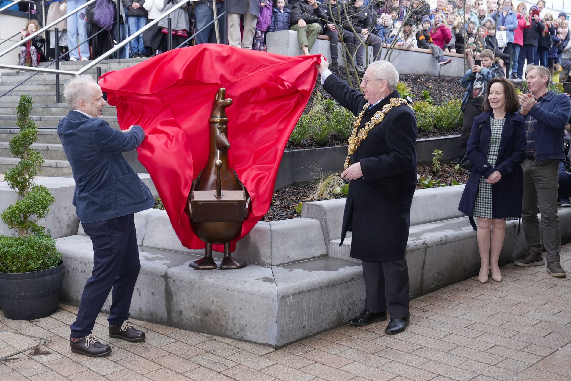 Wallace and Gromit creator Nick Park and the Mayor of Preston, Councillor Philip Crowe, pose next to the statue of the animated character Feathers McGraw at Animate in Preston