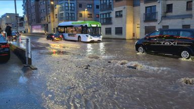 Road remains closed after burst water main floods street