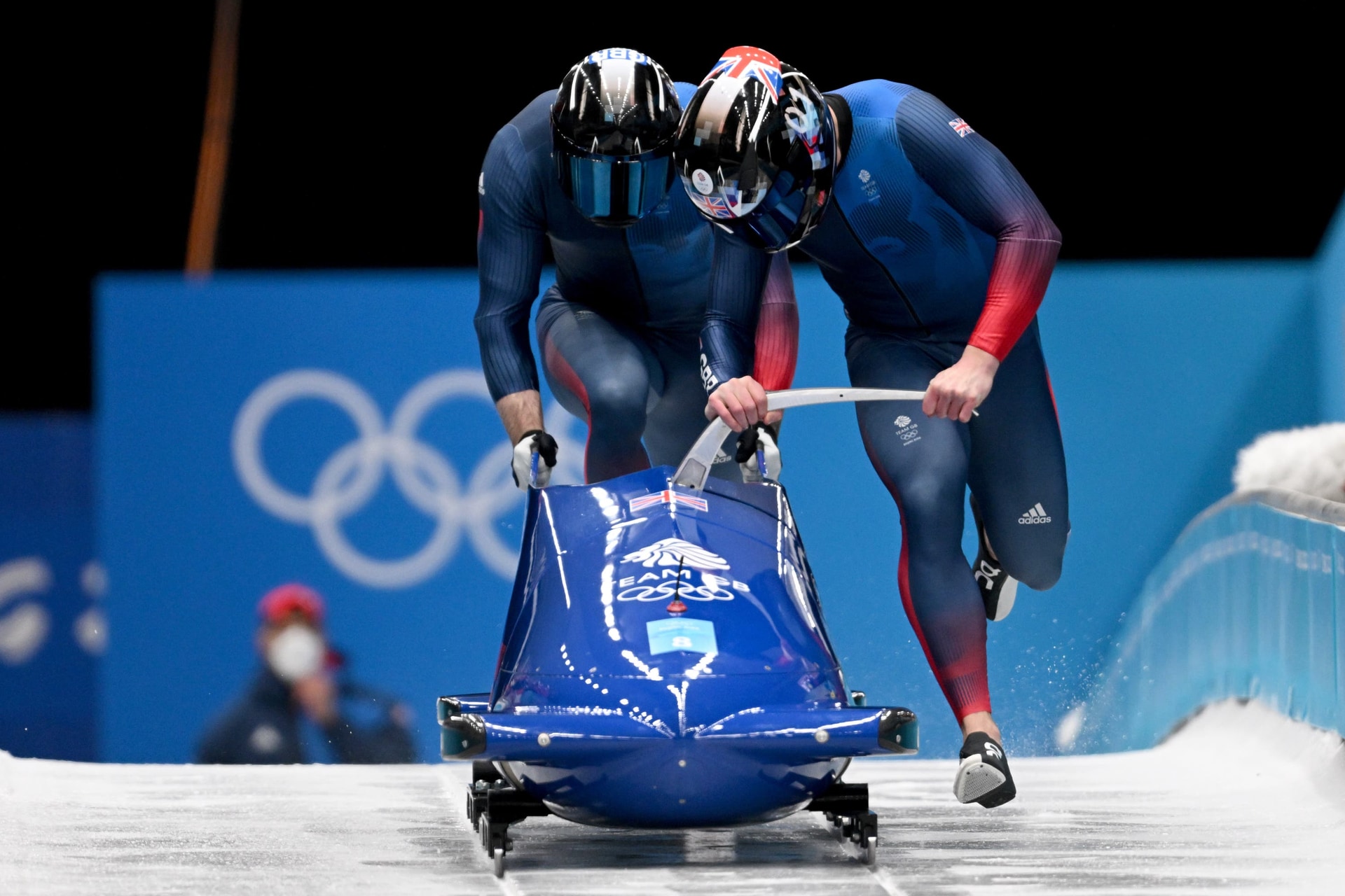 <em>Great Britain’s bobsleigh crew could yet face a trip to Lake Placid (Michael Kappeler/PA)</em>”/><cite class=cite>PA Media</cite></div><figcaption aria-hidden=true><em>Great Britain’s bobsleigh crew could yet face a trip to Lake Placid (Michael Kappeler/PA)</em> <cite class=hidden>PA Media</cite></figcaption></figure><p>Logistically, the Milan and Cortina Games present a unique challenge to Muirhead given the daunting travelling time between the Games’ three major hubs in Milan, which will host the skating disciplines, Livigno, where the freestyle programme takes place, and Cortina, set to host curling and sliding.</p><p>That logistical issue could become a trans-Atlantic headache, with Lake Placid on standby to step in as host of the sliding events should Italian organisers fail in their race against time to rebuild the century-old track in Cortina – in the face of much local opposition – in time to stage the Games.</p><p>“I had a call with the organising committee a couple of weeks ago. They are doing monthly checks and all is up to speed and up to date,” said Muirhead.</p><p>“We’re very calm about it. We’re following the organising committee’s advice and right now we’re all focused on the sliding still being in Cortina. If that does change, then we go with it and it’s all hands on deck to make it work.”</p><div class=