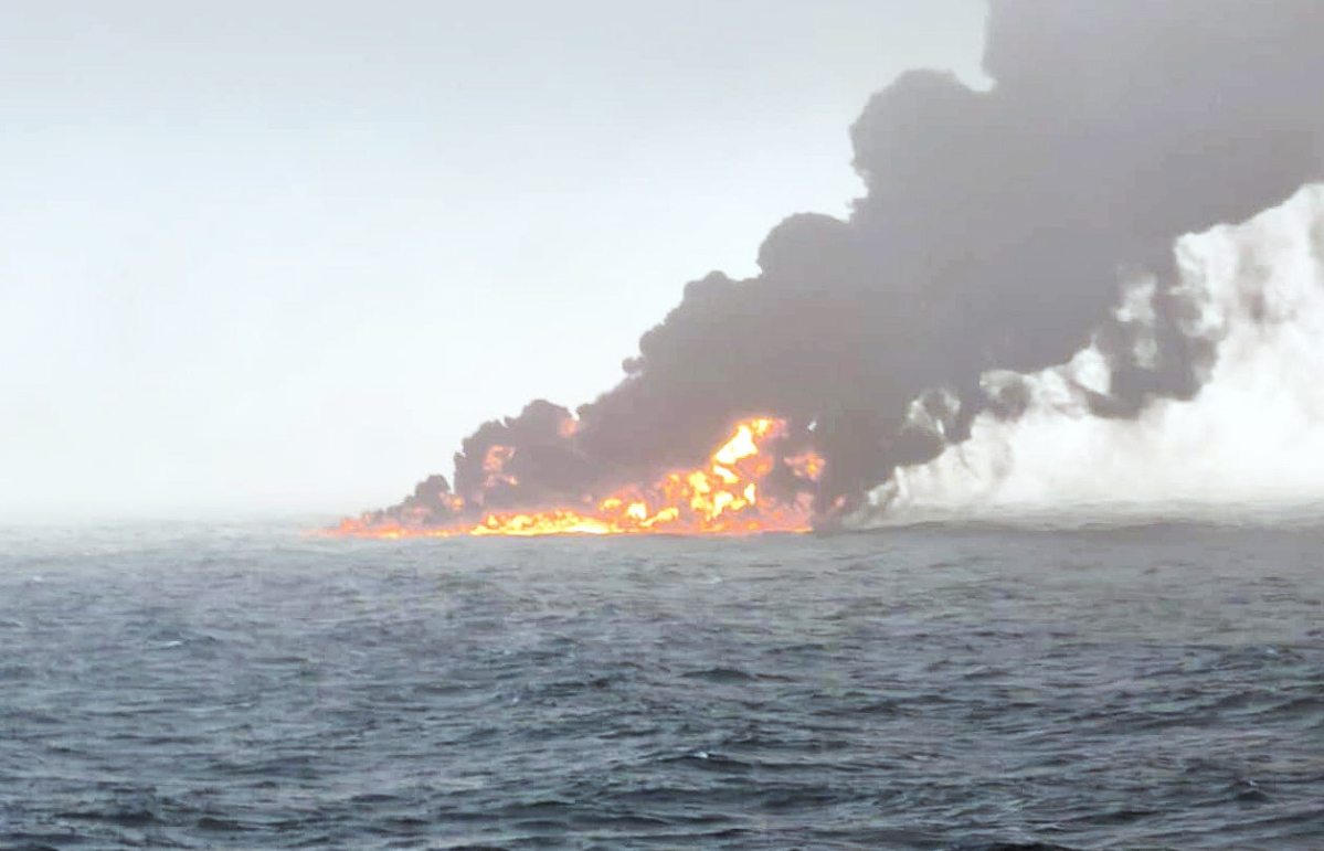 Smoke billowing into the air after a crash between an oil tanker and a cargo ship off the coast of East Yorkshire.