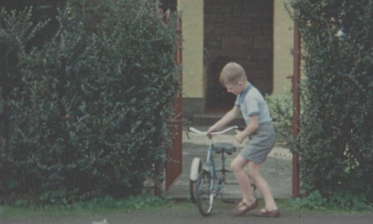 A young Robin sets off on his bicycle