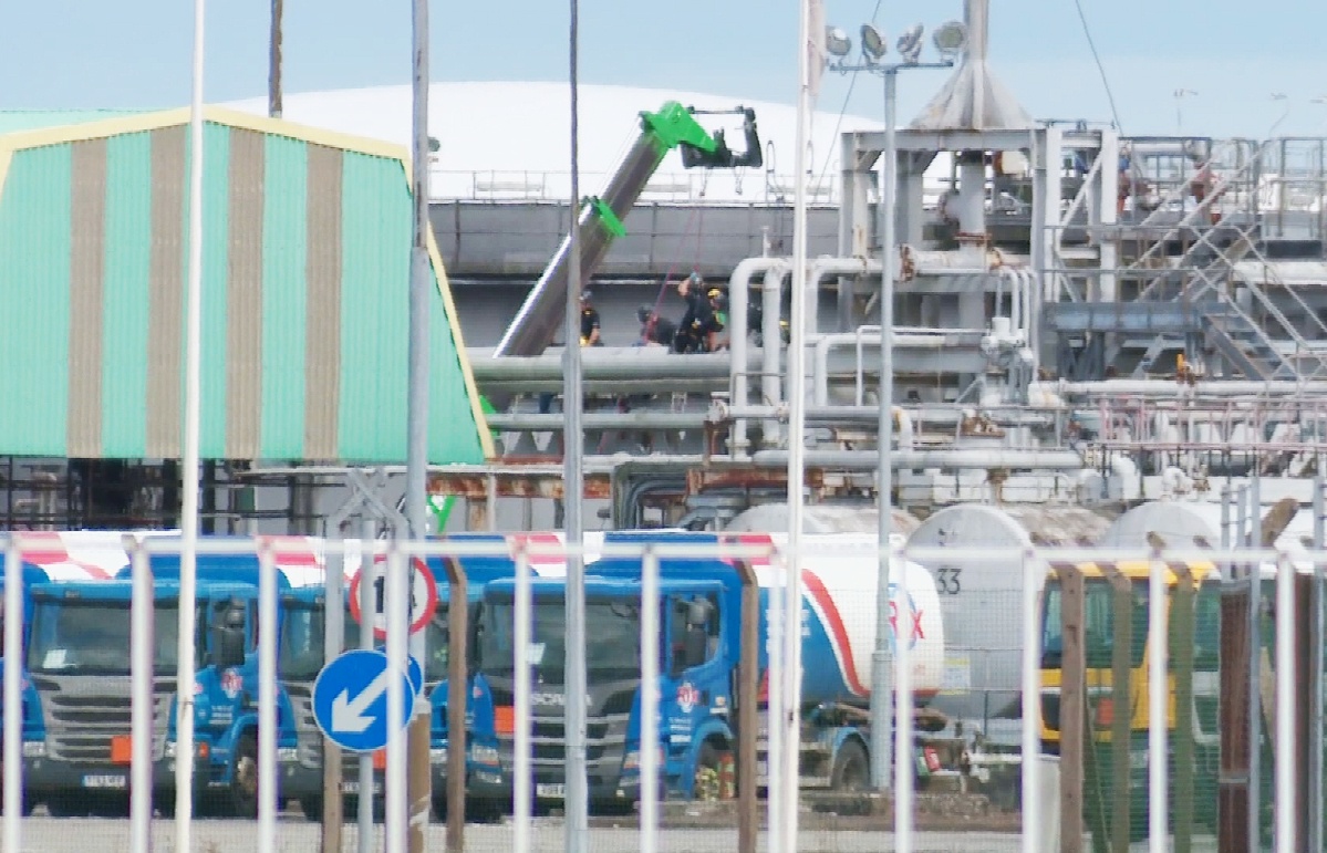 The court was told the trio had got into the plant and climbed onto the facility early in the morning as a tanker was arriving to collect petrol for Tesco.