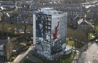 ‘Striking’ Denis Law murals painted on high-rise flats in Aberdeen to honour football legend