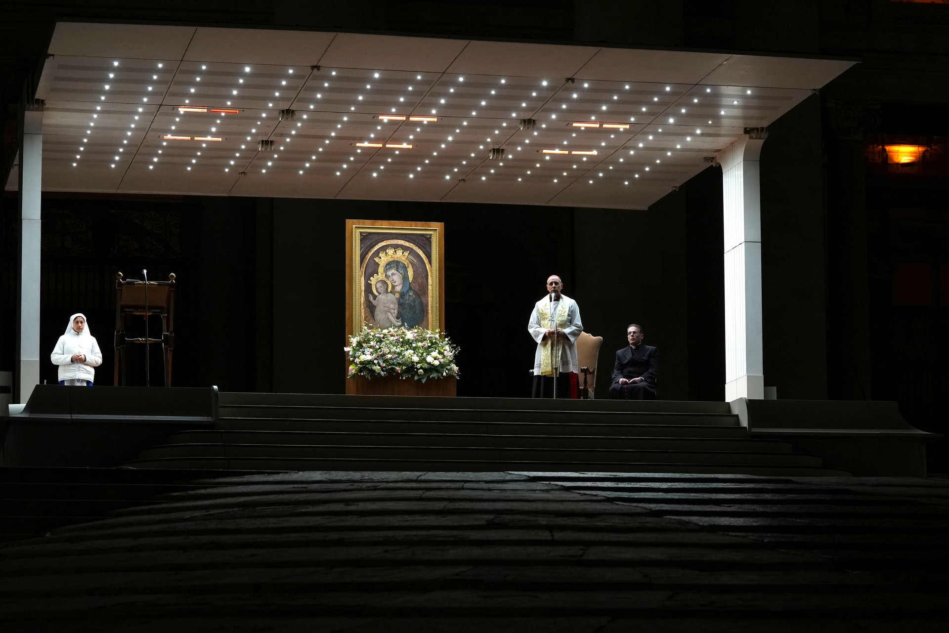 Cardinal Victor Manuel Fernandez, second right, prays during a rosary prayer for the health of Pope Francis in St Peter’s Square (Kirsty Wigglesworth/AP).